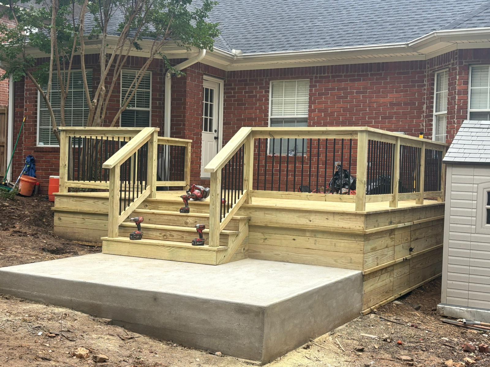Finished deck and concrete patio