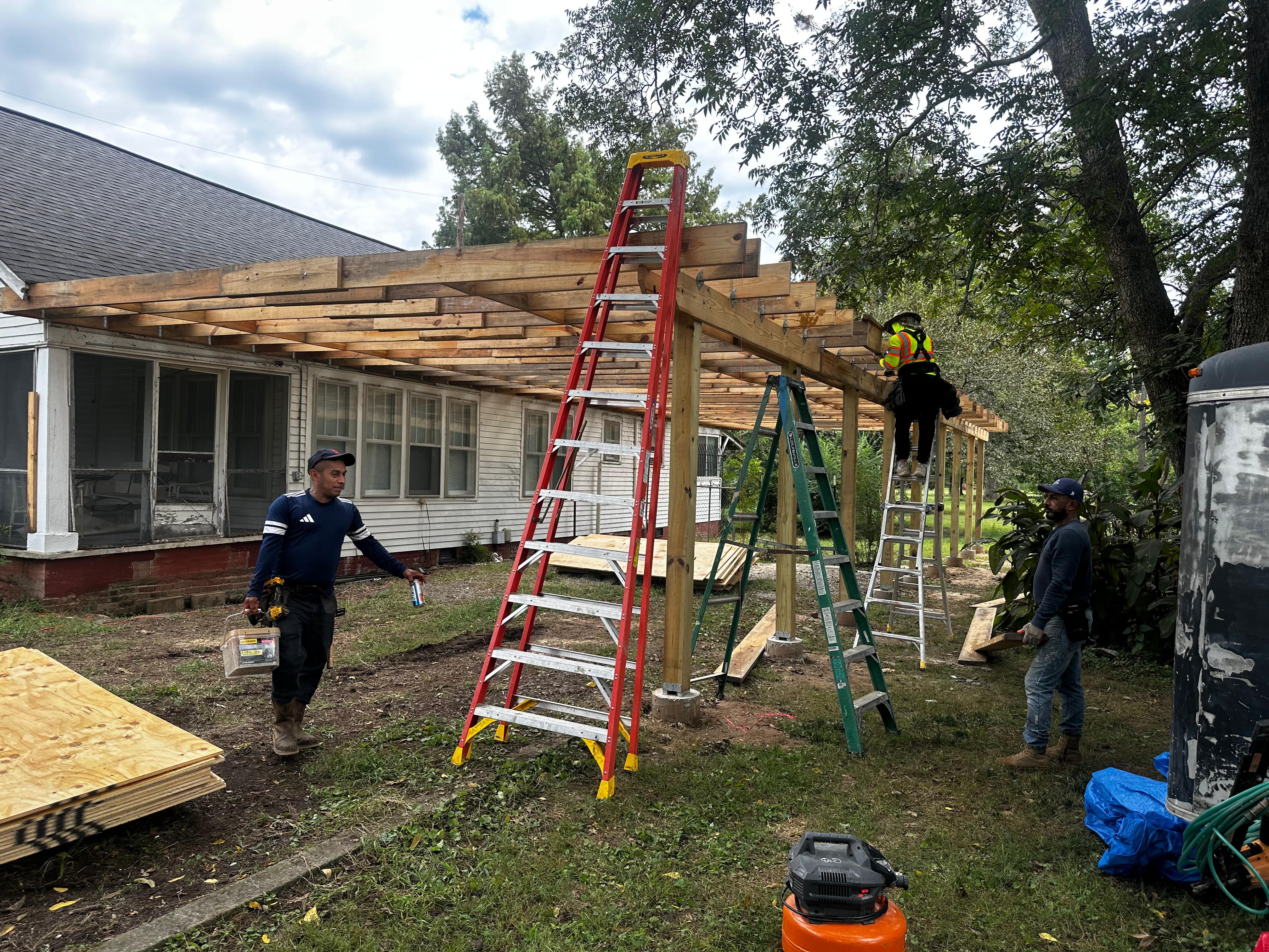PS Construction LLC crew and equipment on site