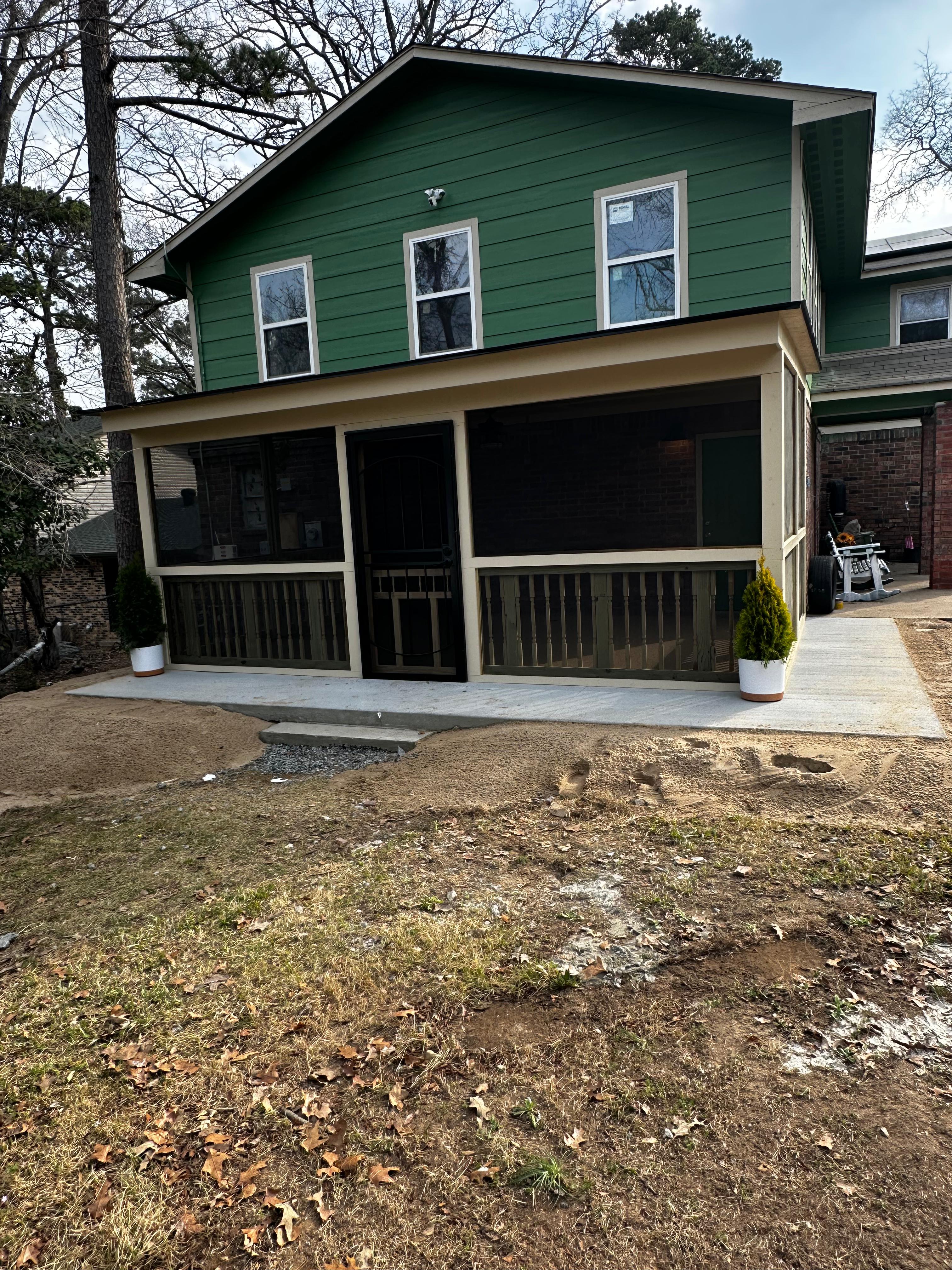 Finished home addition with covered porch