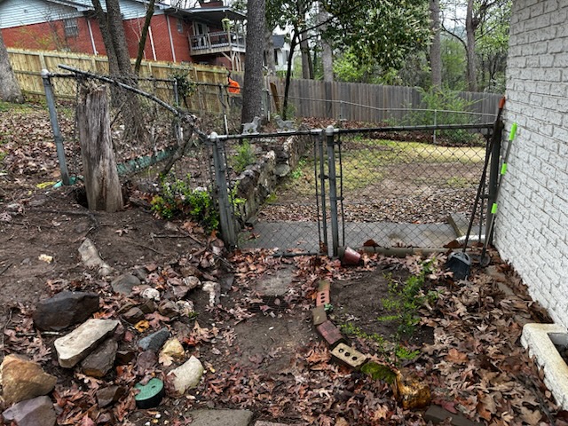 Old chain-link fence before replacement